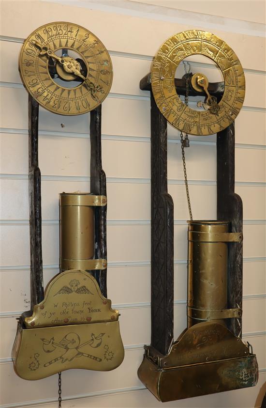 Two 17th century style water wall timepieces largest H.84cm